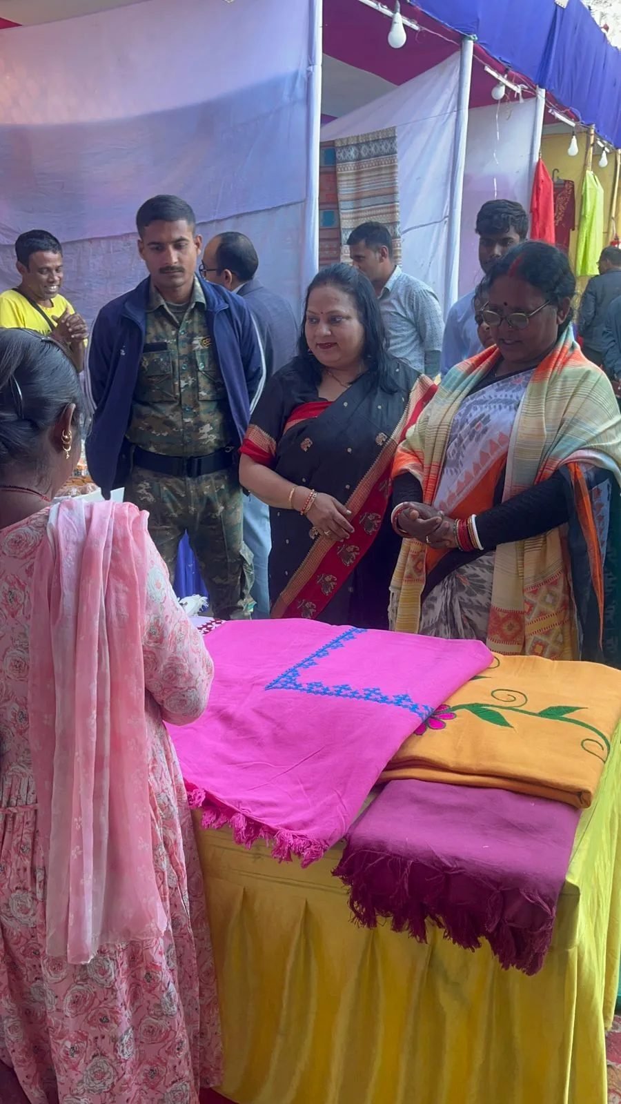 Handmade textiles displayed at a BMKK stall